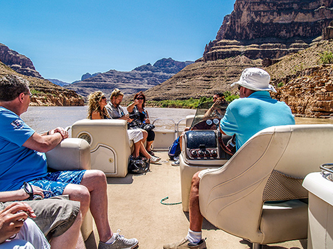 Boating on the Colorado River at the bottom of Grand Canhyon West Rim